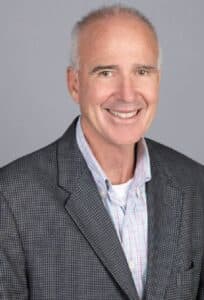 Headshot of CHIN's Senior Vice President Thomas Coyne